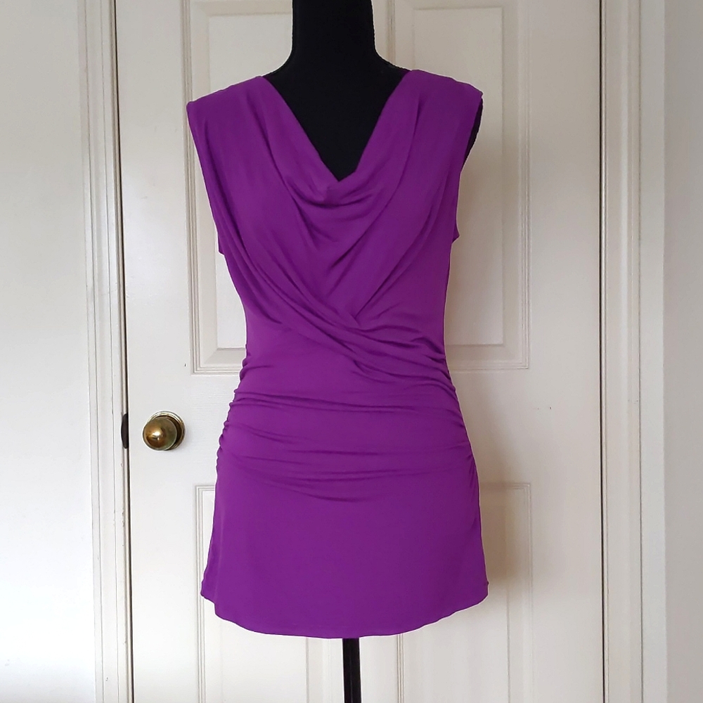 NWT. Express Rayon/Spandex Long Sleeveless top w/front design&waist side elastic